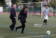 • Paris Mayor, Anne Hidalgo (middle) plays football with IOC President, Thomas Bach, during a visit to the Emile Anthoine Sports Centre in Paris on October 2, 2016