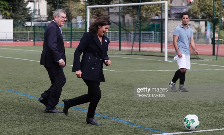 • Paris Mayor, Anne Hidalgo (middle) plays football with IOC President, Thomas Bach, during a visit to the Emile Anthoine Sports Centre in Paris on October 2, 2016