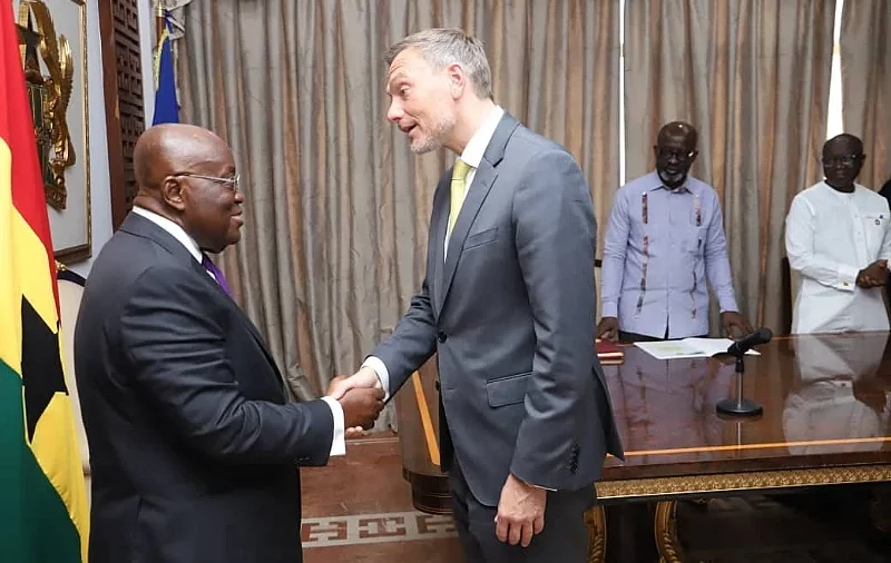 President Akufo-Addo (left) exchanging greetings with Mr Christian Lindner turing