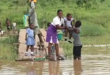 • Some of the children crammed on the canoe going to sch