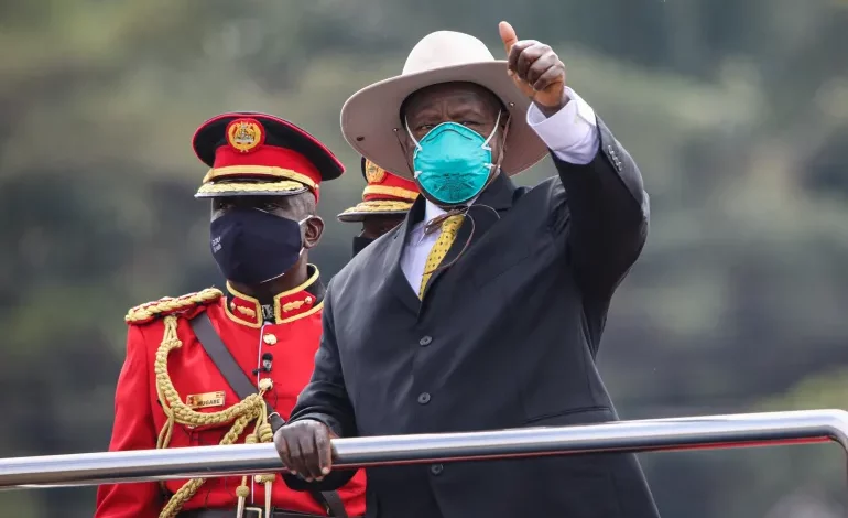 • Ugandan President, Yoweri Museveni, foreground gestures during the inauguration ceremony for his sixth term in Kampala, Uganda, on May 12, 2021