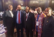 • Mr Augustine Collins Ntim (middle) with some dignitaries at the summit