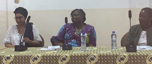 • Prof. Asiedu (in the middle) delivering her remarks at the forum