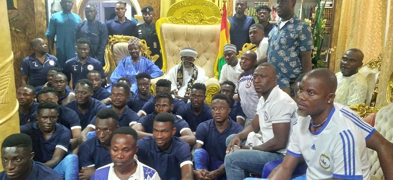 Chief Imam Sharubutu, seated (centre), flanked by players and officials of Berekum Chelsea