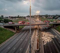 • A general view image of the closed N12 highway as paramedics and emergency service personnel work on the scene
