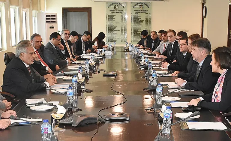 • A handout photo released by the Pakistan Press Information Department (PID) on January 31, 2023 shows government officials and IMF team holding bailout talks
