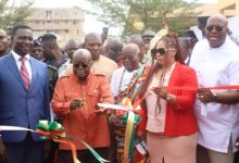 • Inset: President Akufo-Addo (second from left) cutting a ribbon to inaugurate the ICT facility. With him are Dr Yaw Adutwum (left), Mr Henry Quartey (right)