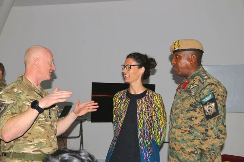 • British High Commissioner, Harriet Thompson (middle) interacting with an officer and Col. Richard Kainyi Mensah (right), Commander Combined Joint Multinational HQ. Exercise Flintlock 2023