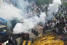 • Protesters face tear gas and water cannons