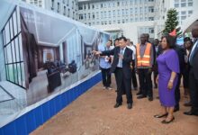 Ambassador Lu Kun(middle) showing Ms Shirley Ayorkor Botchwey and other officials round the drawings of the proposed annex office project. Photo. Vincent Dzatse