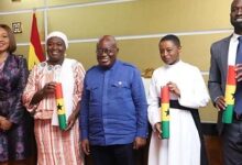 President Akufo-Addo (middle) and Ms Jean Mensah (left) with the three new members to the Board