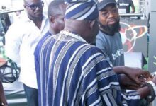 • Appiah (behind) looks on as Asafoatse Nii Madoshwe III (right) supported by Rex Danquah Jnr cut the tape for the opening of the Betway Osu Experience Centre
