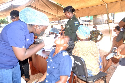 .Doctors checking the teeth of security personnel and others Photo Victor A. Buxton