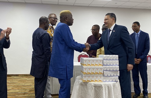 • Mr Seini in a handshake with Egyptian Ambassador to Ghana, Aldesouky Mahmoud Youssef while other dignitaries look on