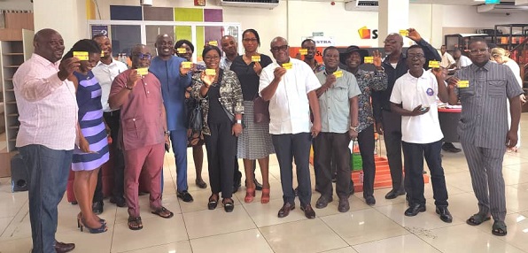 Some members of the Ghana Hotels Association displaying their loyalty cards