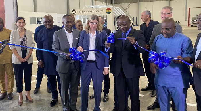 Inset, Mr Jinapor (second from right) cutting the tape to inaugurate the plant. With him are Ms Biene (middle), Mr Peprah (fourth from right) and other dignitaries