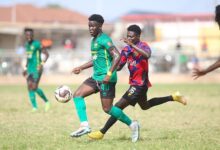 • Legon Cities Kwabena Adu Meider gives Eric Serge Zeze a hot chase for the ball