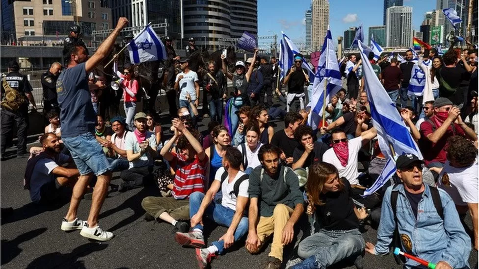 • Tens of thousands of protesters have taken to the streets across Israel