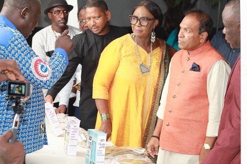 • Mr Sugandh Rajaram (second from right) and other dignitaries interacting with a CSIR representative at one of the exhibition stands