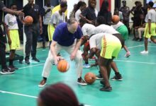 • Mr Craig Emhoff going through some basketball drills with the participants