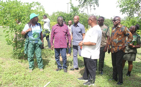 • Mr Owusu-Bio (second from left) with officials of the Ministry and Forestry Commission during the tour Photo: Anita Nyarko-Yirenkyicreated