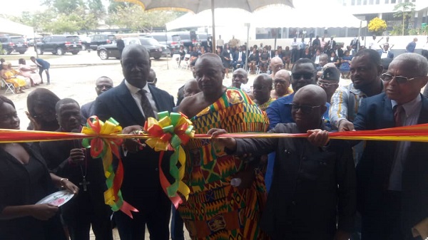 • Inset: Chief Justice Yeboah (left) being assisted by other dignitaries to cut the tape to officially open the court