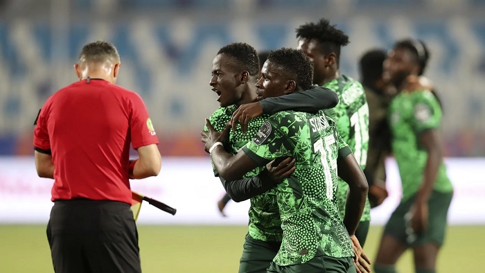 • Nigeria celebrating a goal against Uganda