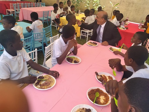 • Mr Alsattari feeding one of the children