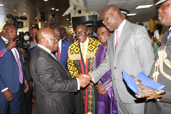 • President Akufo-Addo (left) exchanging greetings with Dr Ato Forson Photo: Ebo Gorman