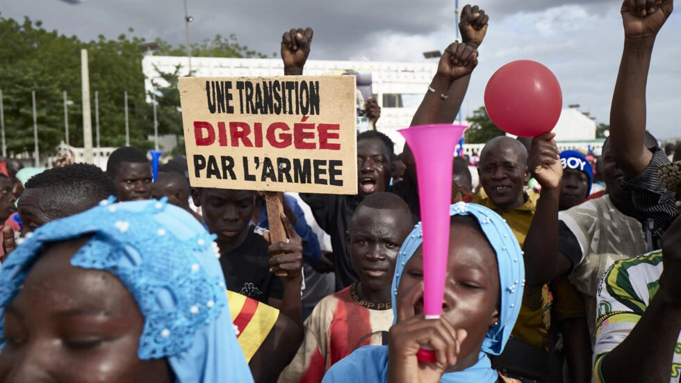 • Supporters of the National Committee for the Salvation of the People take part in a rally at Independence square in Bamako