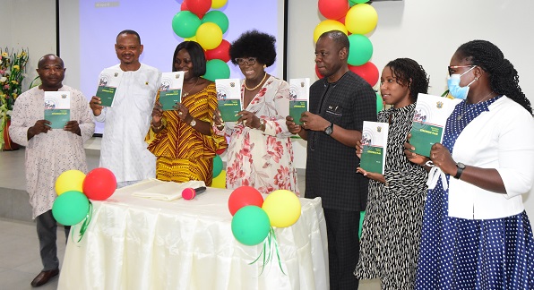 • Ms Tina Naa Ayeley Mensah (middle) and other dignitaries launching the plan