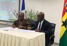 • Mr Agyeman-Manu (left) and a representative of Sanofi about to sign the MoU