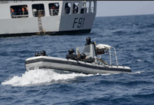 • Nigerian naval special forces patrol during a navy exercise with the United States