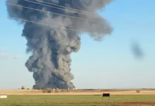 Smoke rises from the scene of South Fork Dairy near Dimmit, Texas