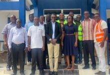 Mr Michael Buabin with Ghana Water Company Limited officials after the meeting