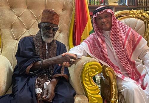 National Chief Imam, Sheikh Sharubut(left) in a hand- shake with Mr Al- Bakr.