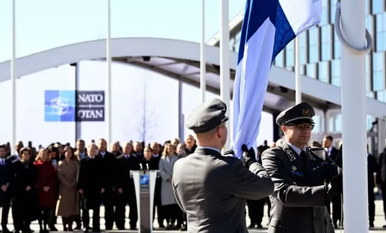 • Finnish military personnel raised their country's flag at NATO headquarters for the first time