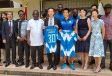 • Jindo and the Japanese Ambassador (holding jerseys) with club officials and other dignitaries after the outdooring
