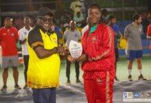 • Mary Dodoo receiving her award from Mr Nannerman