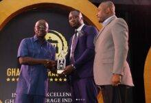 • Mr Ofei (second from right) receiving the award from Mr Boateng
