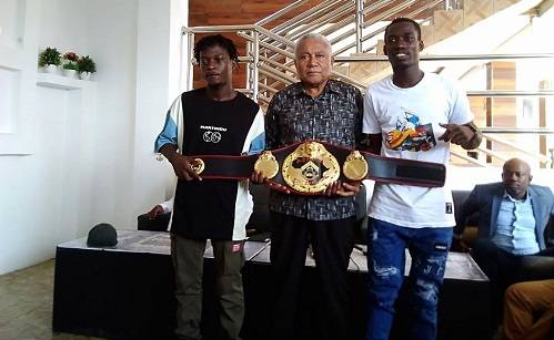 • Mr Samir Captan (middle), Laryea (right) and Martey with the title