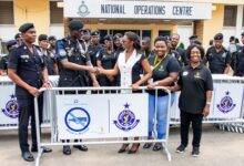 Ms Osei-Tutu (third from right) presenting the items to ACP Abass Al-Meyao
