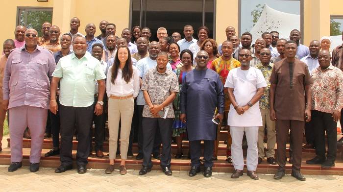 Mr Quartey(right) and Mr O.B Amoah (third from right) with other participants after the programme