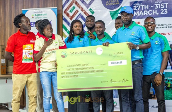 • Some of the women singing during the programme The Managing Director of Agromonti, Mr Benjamin Offei (second right) presenting a cheque to Ms Sedzodzo