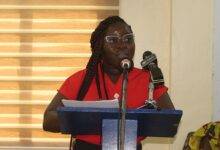 Ms Ankomah (inset) addressing the speaking at the event