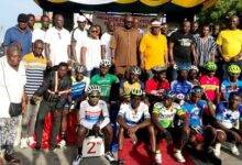 The cyclists with organisers and other dignitaries after the event