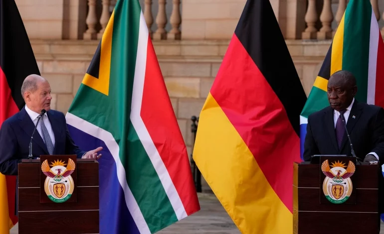 German Chancellor, Olaf Scholz, left, speaks during a joint press conference with South African President, Cyril Ramaphosa, at the Union Building in Pretoria, SouthAfrica on Tuesday