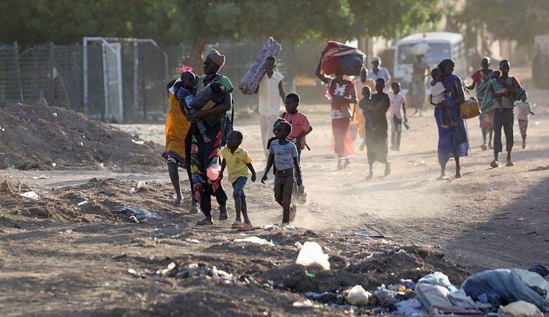 Sudanese fleeing the violent clashes in Khartoum