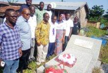 Dr Akoto (fourth from left) after laying a wreath at the tomb of Mr Anto