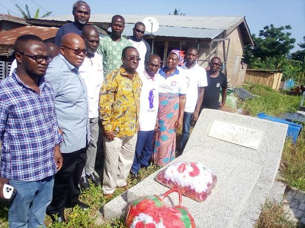 Dr Akoto (fourth from left) after laying a wreath at the tomb of Mr Anto